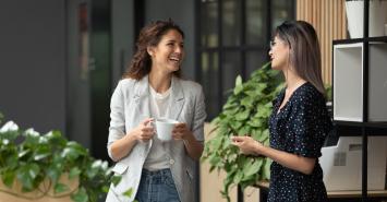 2 women chatting over coffee
