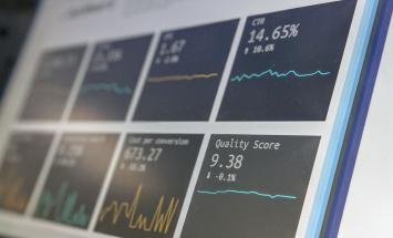 Laptop screen with line graphs