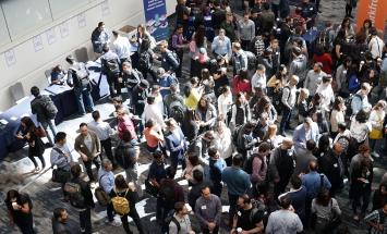 Crowd registering for a conference
