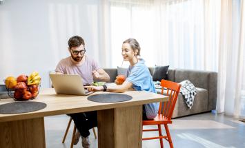 two people at kitchen table