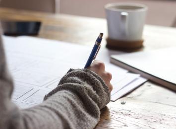 A person's hand writing