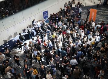 crowd of people in building lobby
