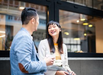 Two people laughing