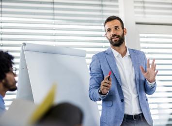 Man teaching a group of people