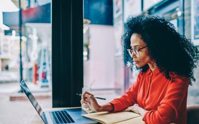 Person at a desk with laptop