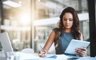 young woman looking at laptop