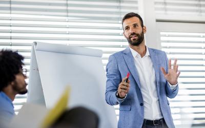 Man teaching a group of people