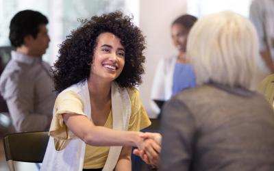 two women handshake